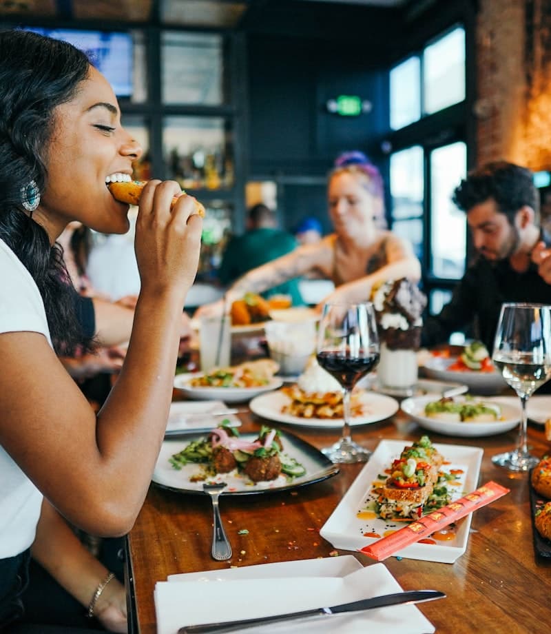 Woman enjoying dinner out at a restaurant